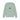 Light green sweatshirt with a dog graphic and floral wreath on a white background